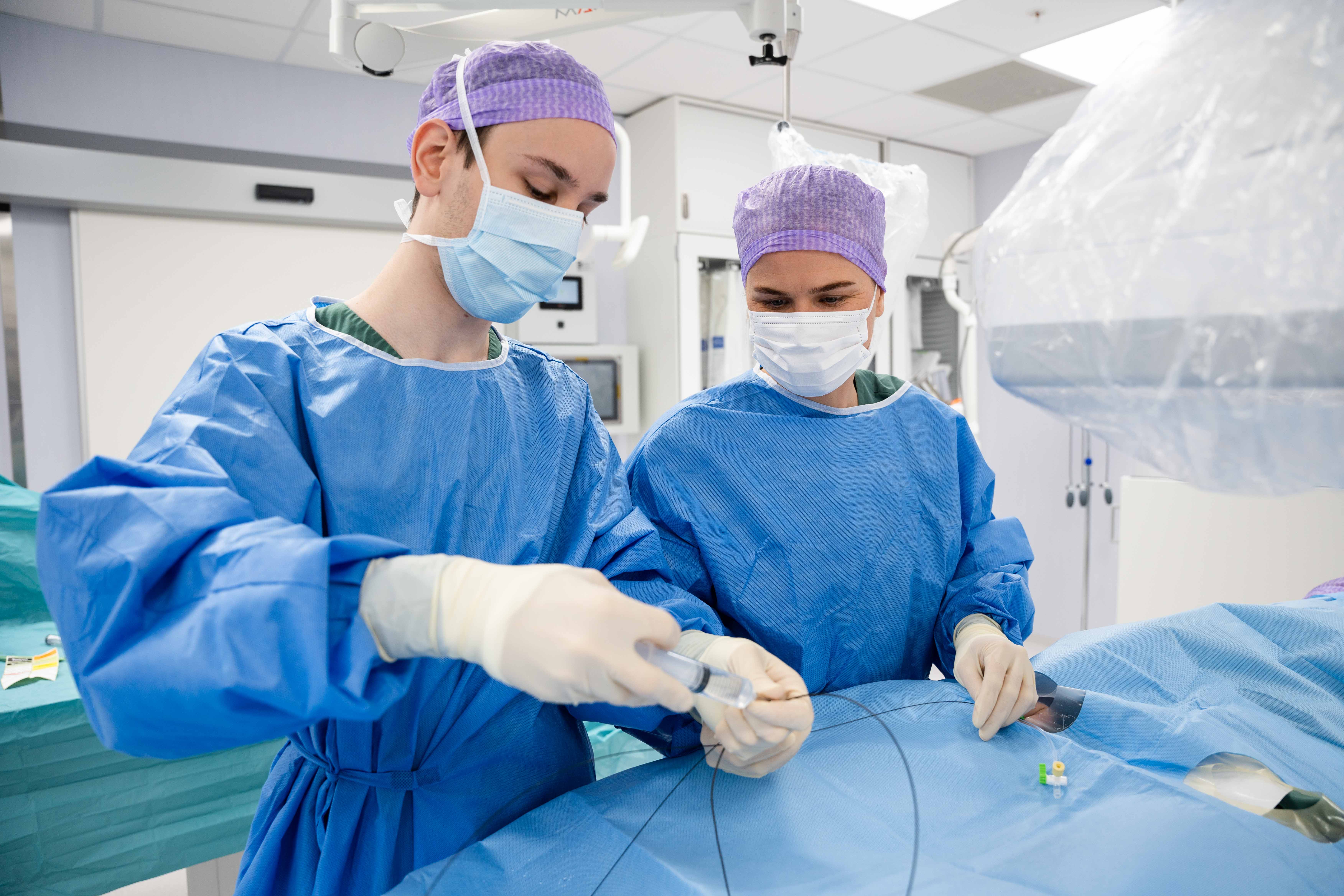 A group of surgeons performing surgery