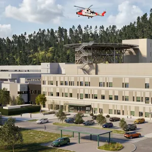 A helicopter flying over a building