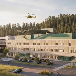 Et helikopter som flyr over en bygning